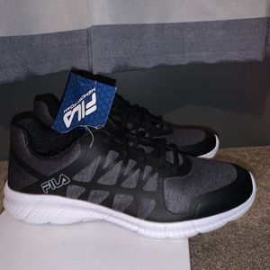 Black and grey fila running shoes size 8.5